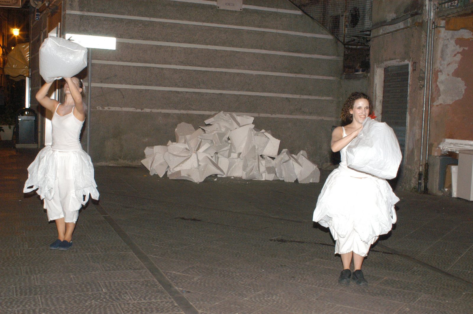The Invisible Cities, street performers in white with foam debris